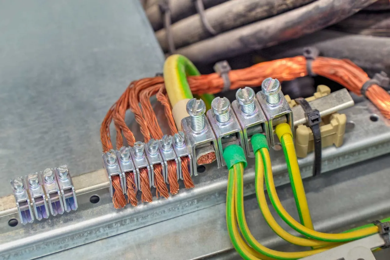 How does proper grounding reduce the risk of electrical fires